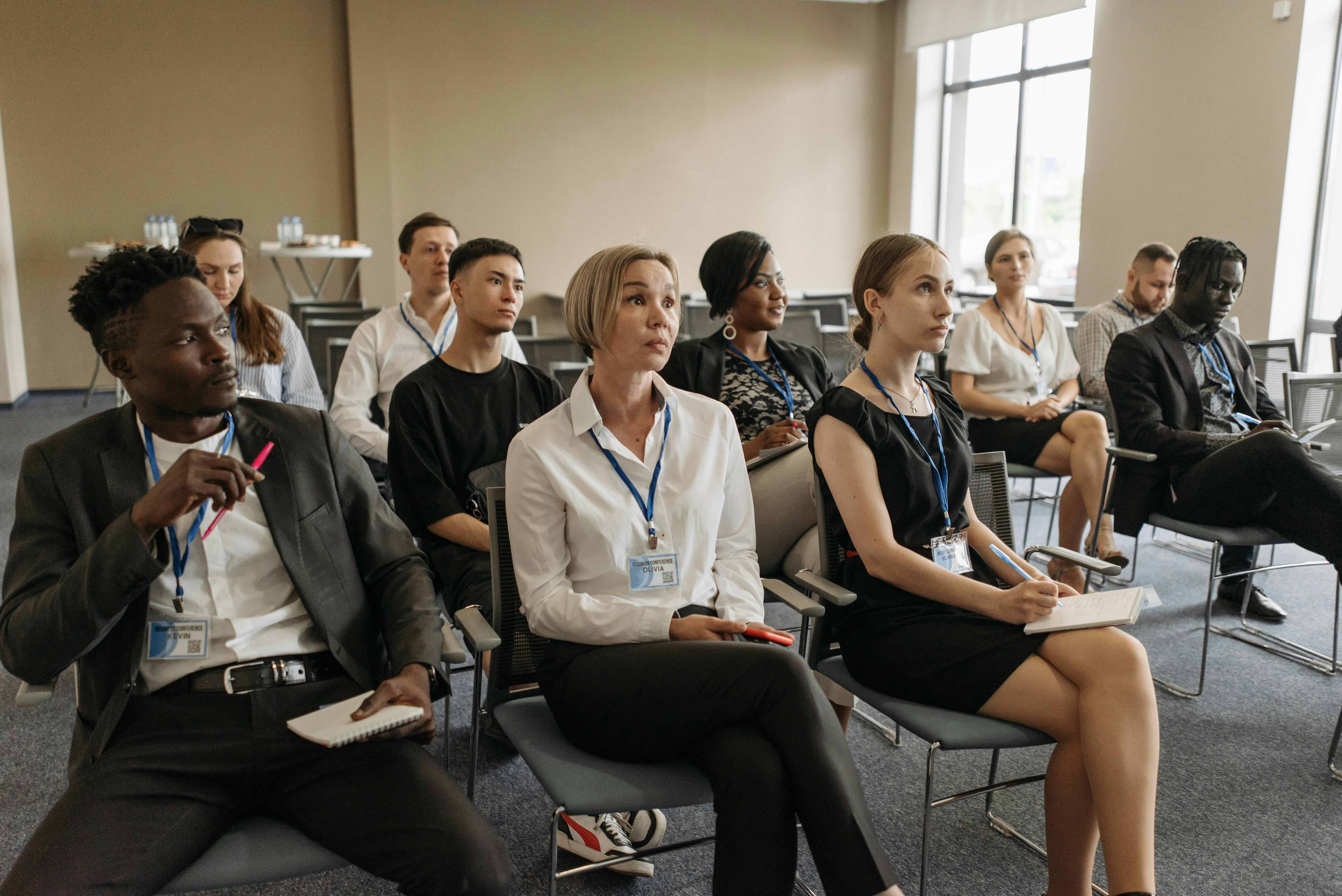 School and childcare professionals attending KCSIE 2025 safeguarding training session – mandatory staff development